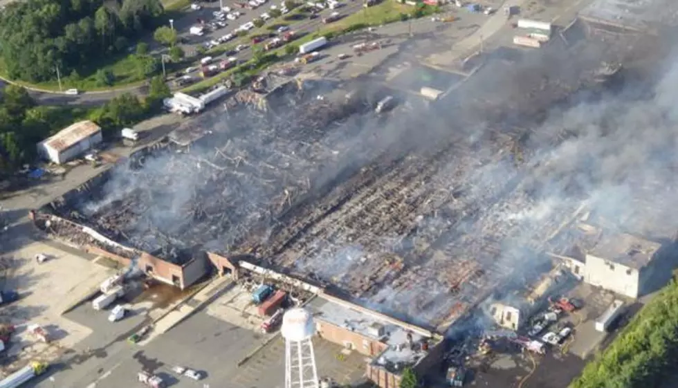 North Brunswick warehouse fire still burns