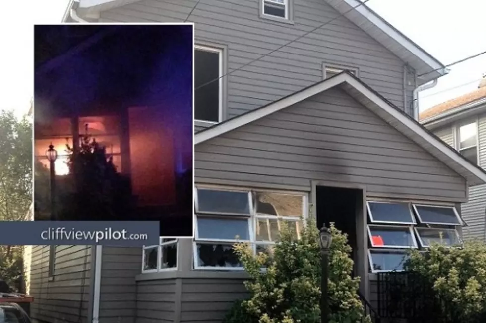 Off-duty officer helps rescue 2 trapped at burning home