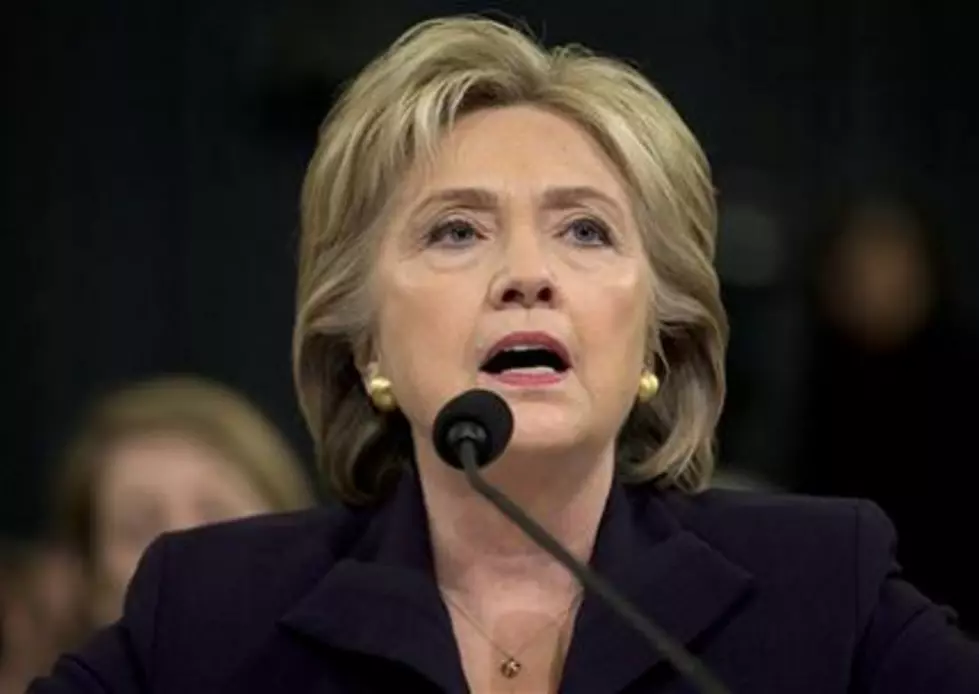 Clinton defends herself on Benghazi as GOP probes her record