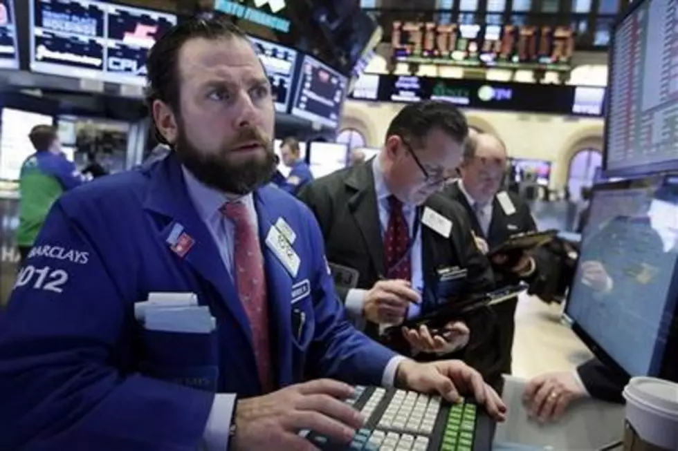 Stocks slide as oil tumbles, S&P lowest in almost 2 years