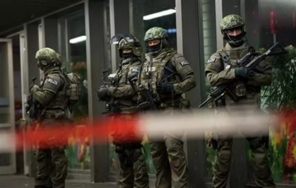 Munich terror warning remains in place as train stations reopen