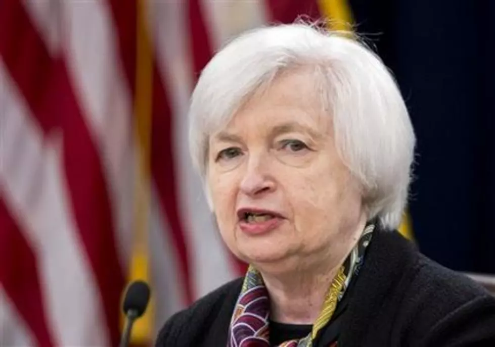 Fed keeps key rates unchanged; foresees fewer hikes in 2016