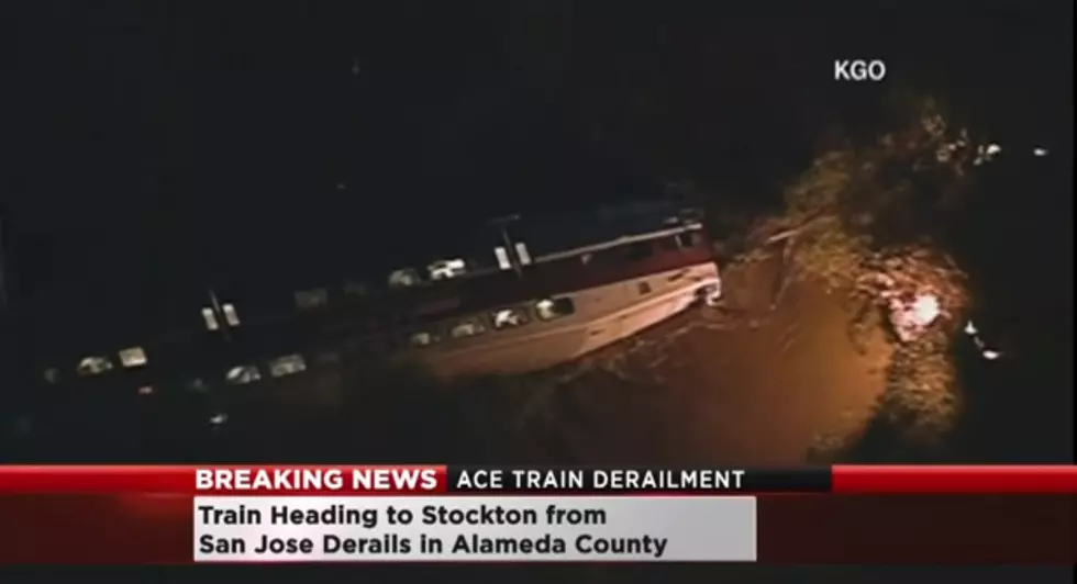 9 hurt as train derails, car plunges into California creek