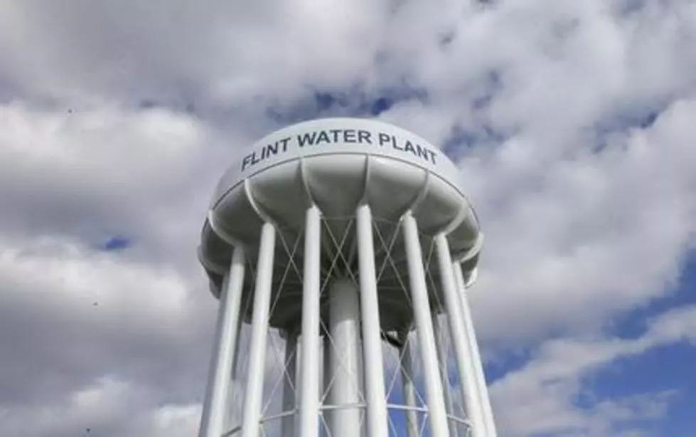 6 more Michigan public workers charged in Flint water crisis