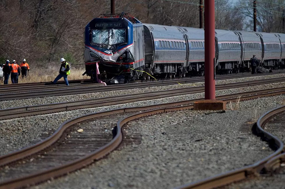 Officials: Amtrak engineer hit brakes seconds before crash
