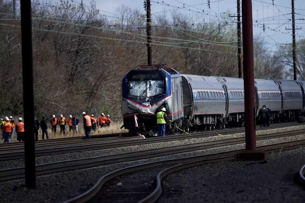 Backhoe in Amtrak wreck had periodic right to be on tracks