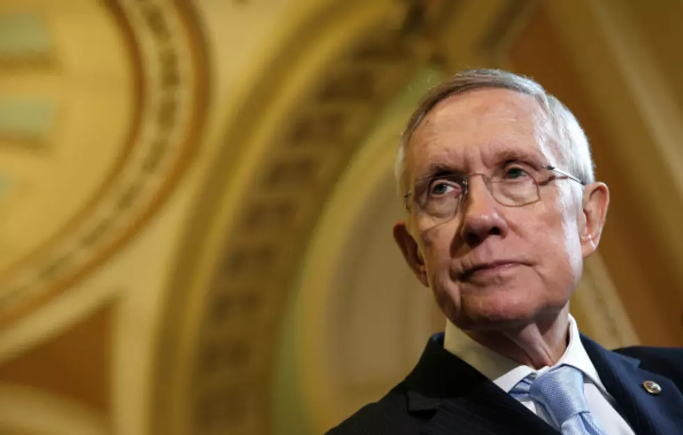 Reid wants budget business resolved before year-end