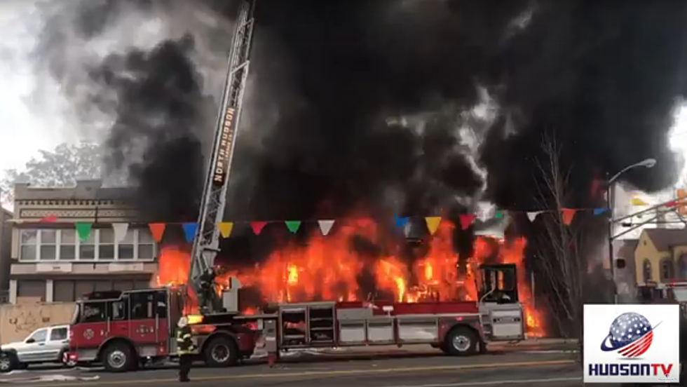 Photos, video of massive fire raging through North Bergen store