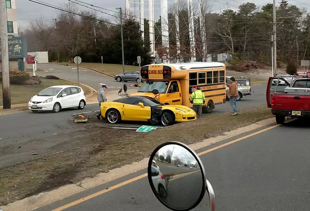 No injuries after sports car crashes in front of school bus in Toms River
