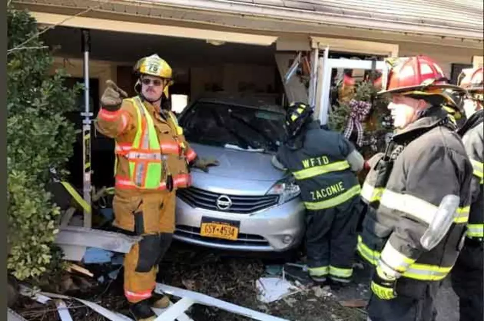 Elderly woman hits the gas and backs into NJ house, report says