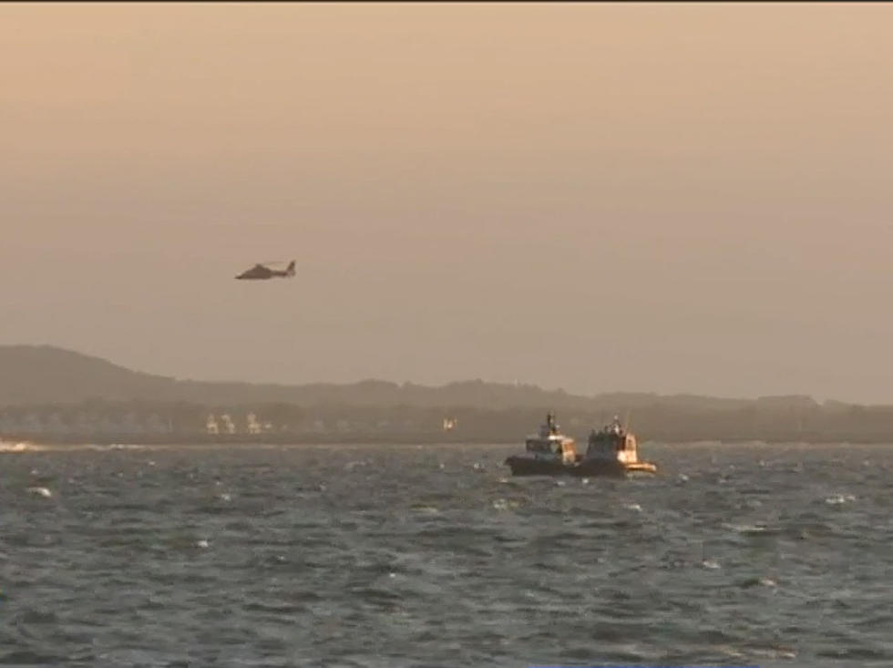 Search for unconscious Sandy Hook kite surfer blown from rescuer’s grip