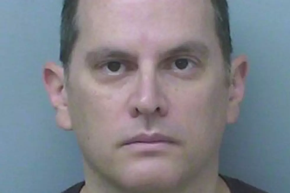 Dentist charged with inappropriately touching female staff
