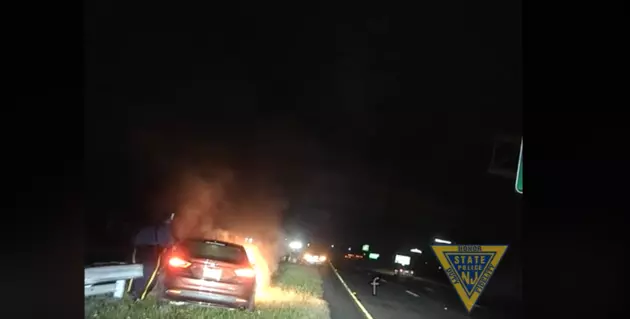 Watch hero NJ State Troopers save man from burning car