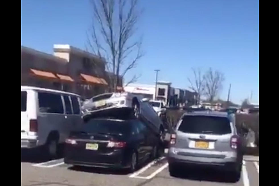 Car ‘parked’ on top of another car at NJ shopping center