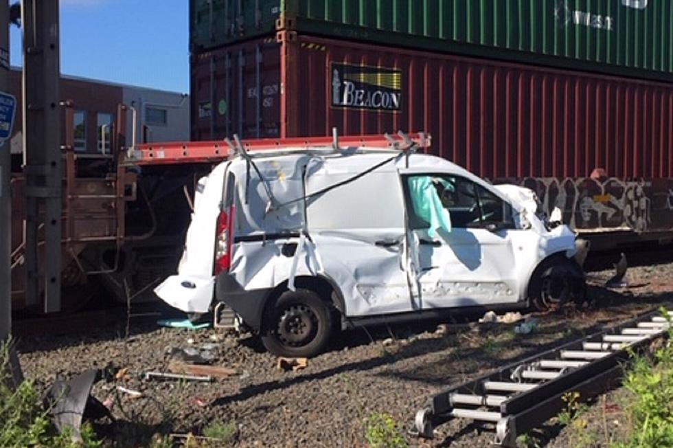 Van crashes into freight train in South Plainfield