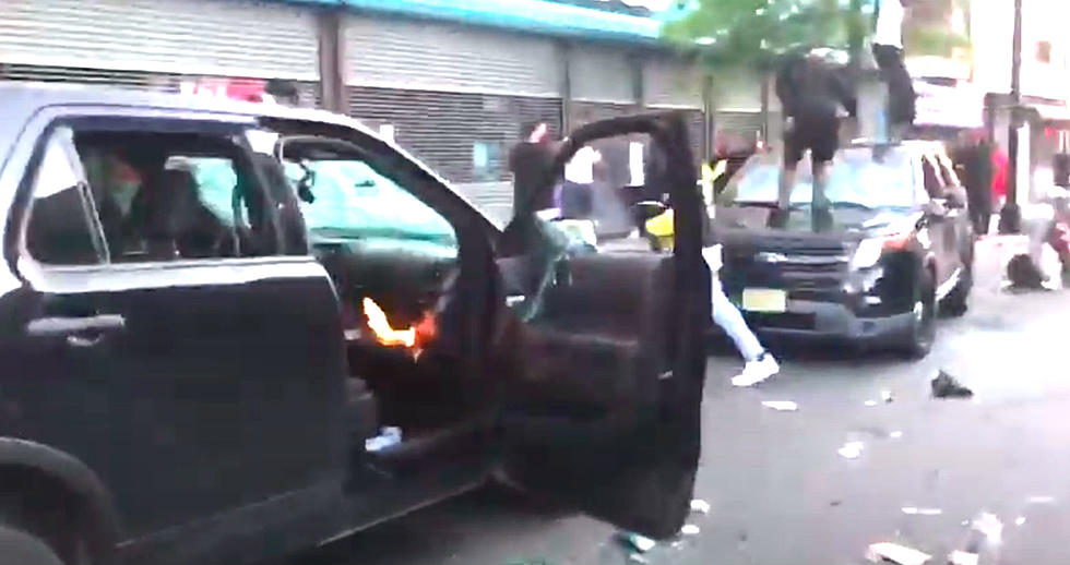 Feds charge 2 more protesters with trying to torch Trenton cop car