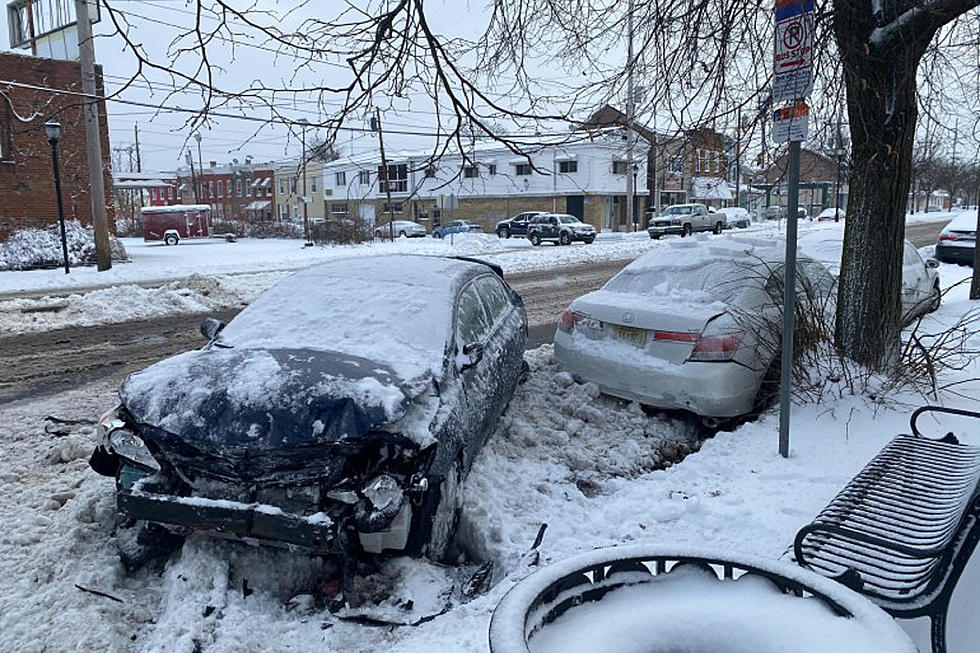 Snow plow slams into parked cars, damages house in Hamilton
