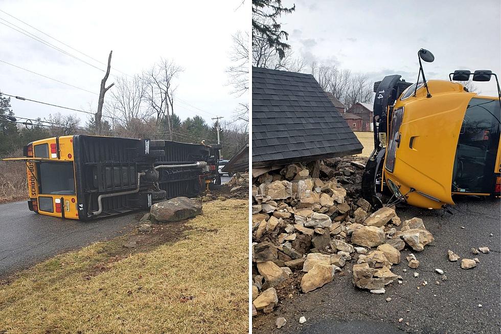 NJ school bus overturns after wrecking stone building in Clinton