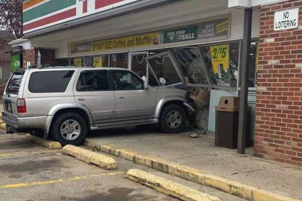 Oops! SUV drives through front of NJ 7-Eleven store