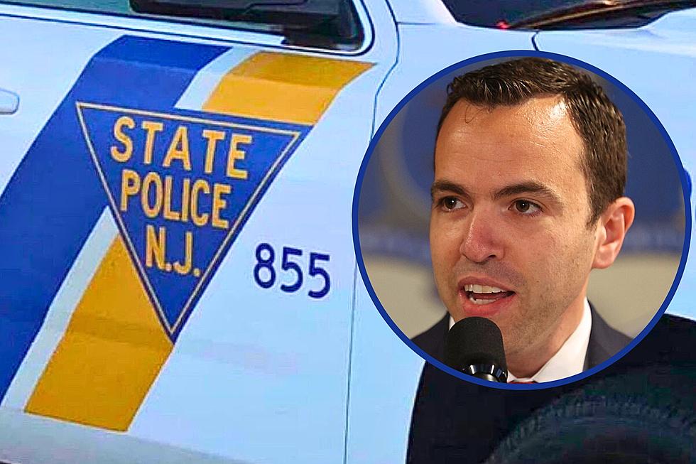 NJ state trooper charged after hitting handcuffed woman