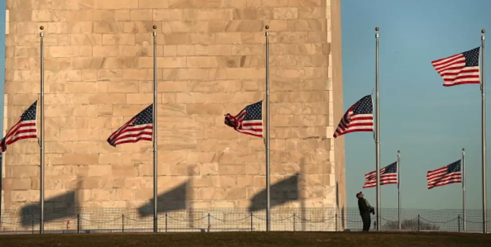 Flags Flown at Half-Mast, NY Landmarks Lit Blue Amidst Pandemic