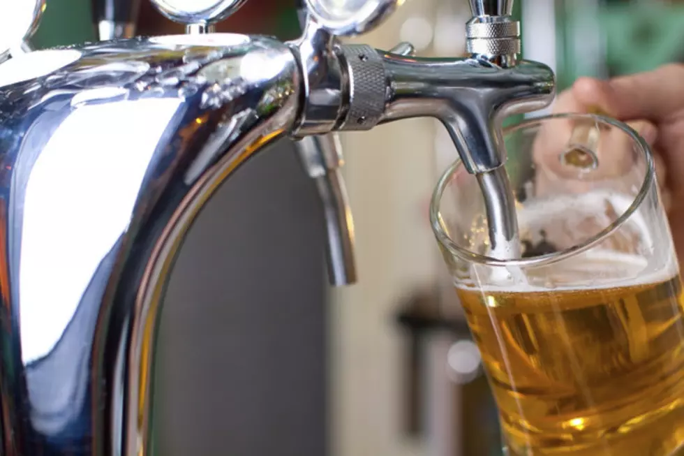 Man Pours A Brand New Beer Into A Glass Using His Head [WATCH]