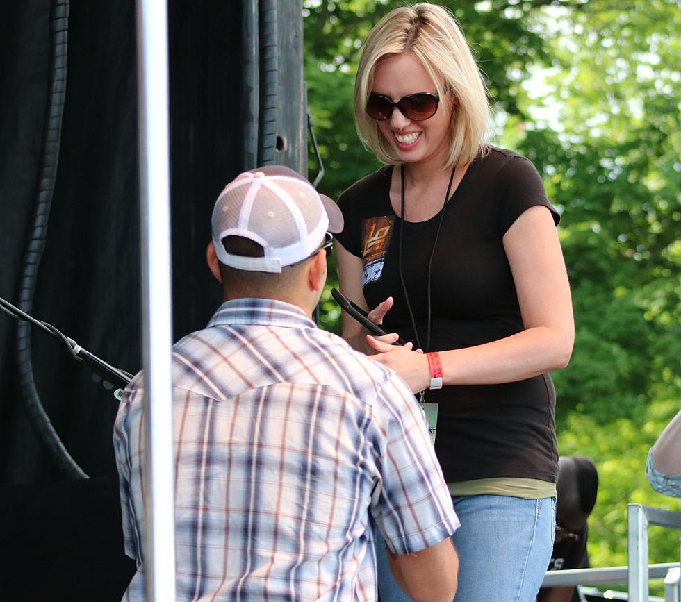 Farmer Gets Engaged on the FrogFest Stage