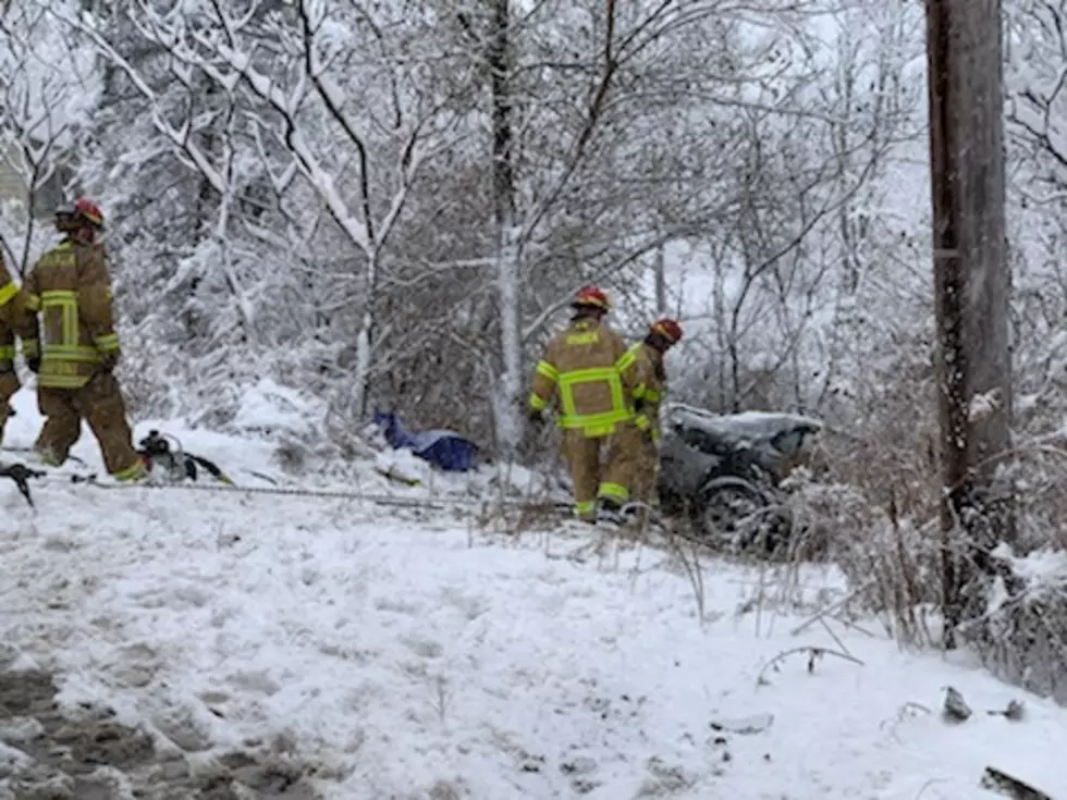 Crews Rescue Woman Trapped in Car After Collision with Plow