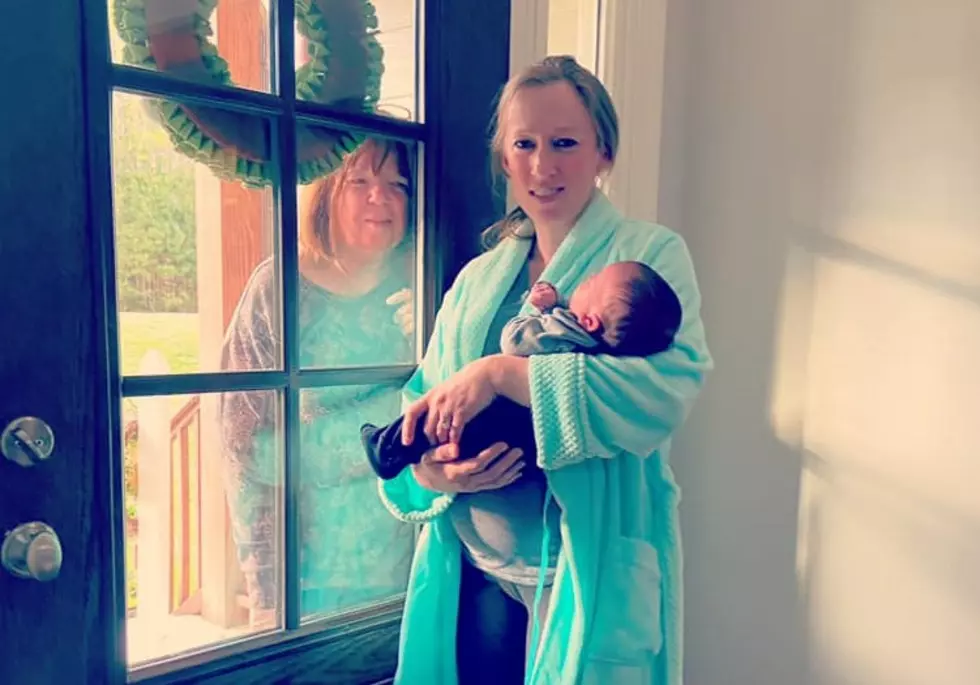 Heartbreaking Moment Grandmother Meets New Grandson Through a Window
