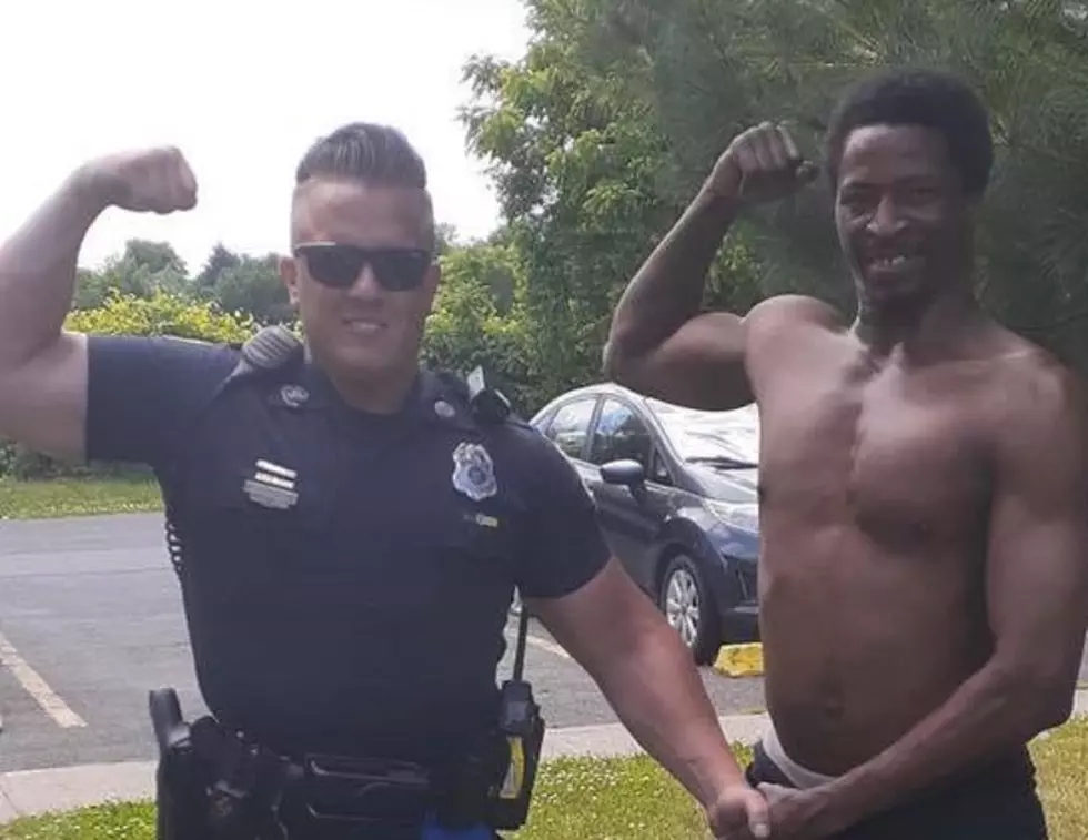 Police Officer Lift Weights With Rome Man 