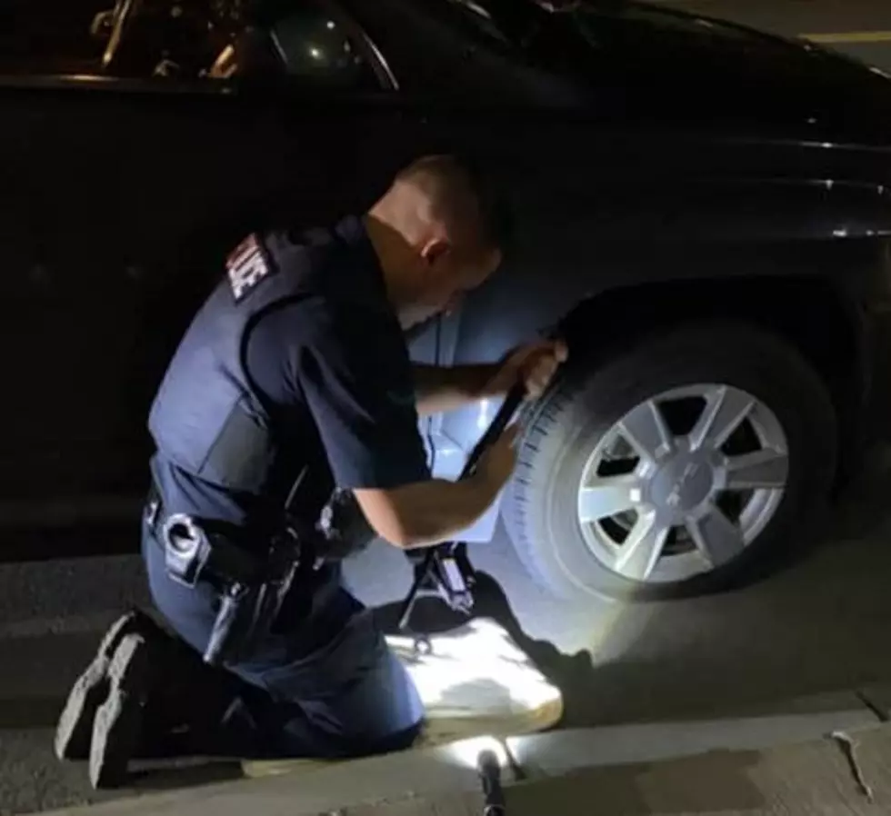 Cop Helps Central New York Woman Change Flat Tire