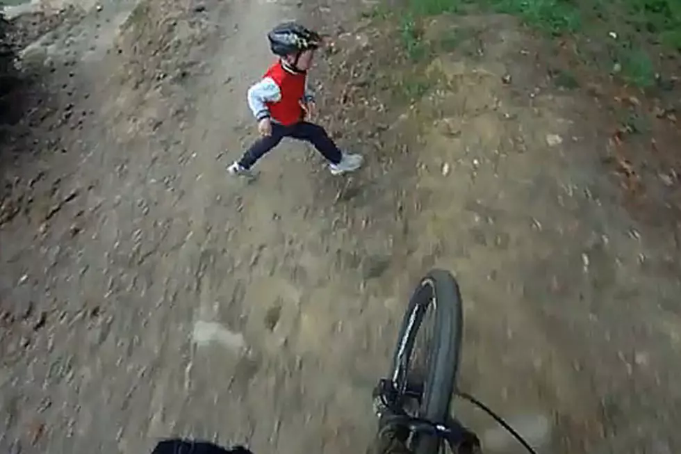 Mountain Biker Runs Full Speed Ahead Into Little Boy