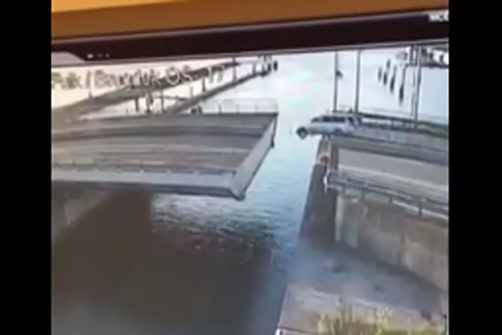 Watch Driver Spectacularly Fail to Jump Bridge