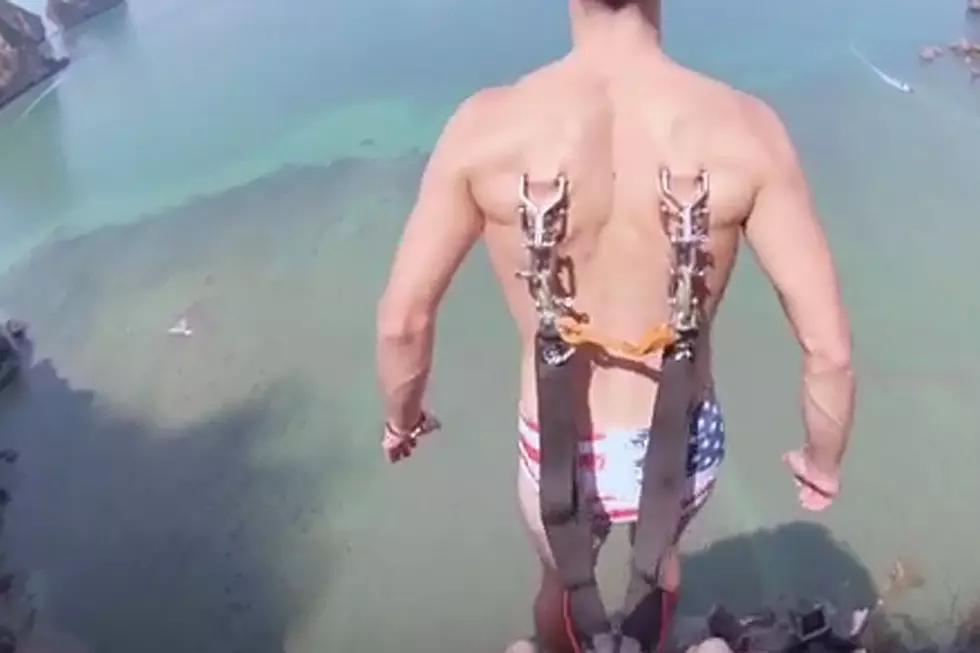 Insane BASE Jumper Pierces Back With Parachute Hooks Because Pain Is Cool [Video]