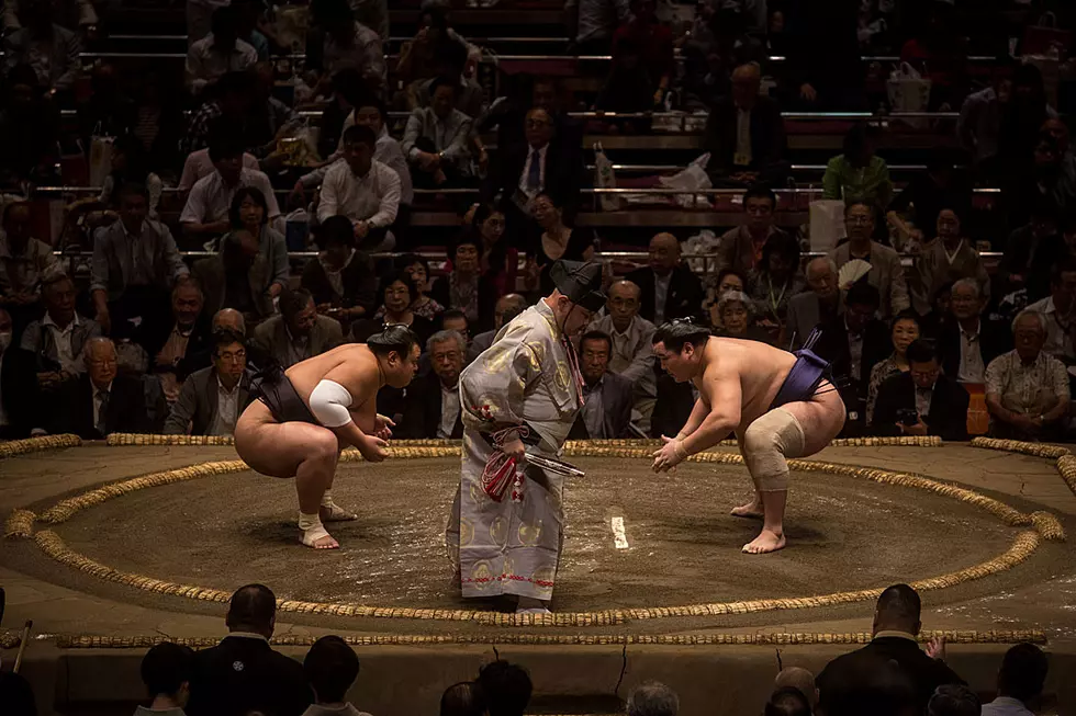 Sumo Wrestlers Tilt Earth