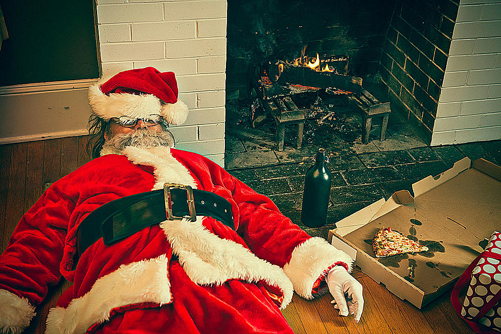14 Perfect Captions for This Hammered Santa Claus