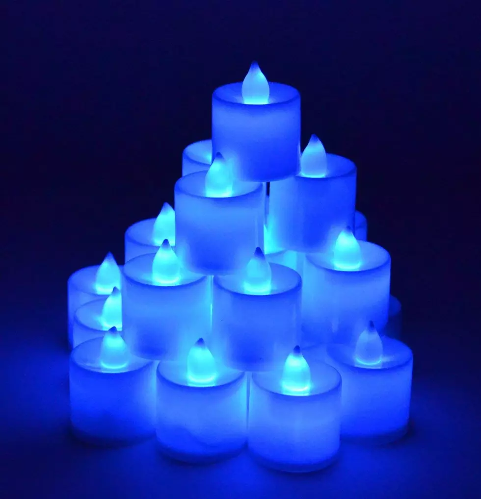 Why You Should Put a Blue Candle in Your Christmas Window