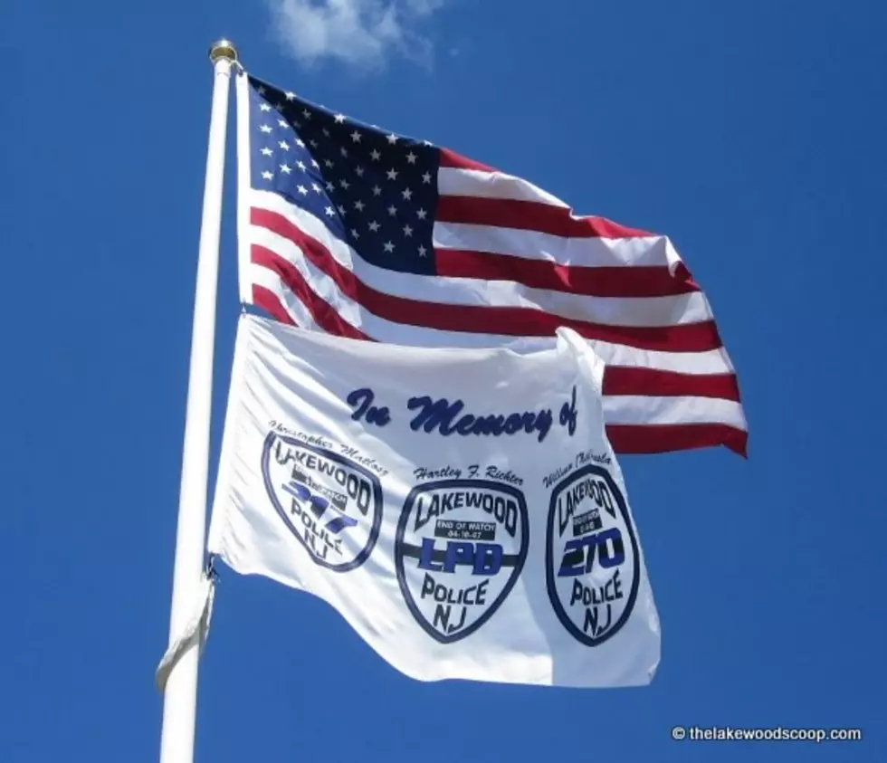 Flags fly half-staff in Lakewood in memory of a murdered police officer