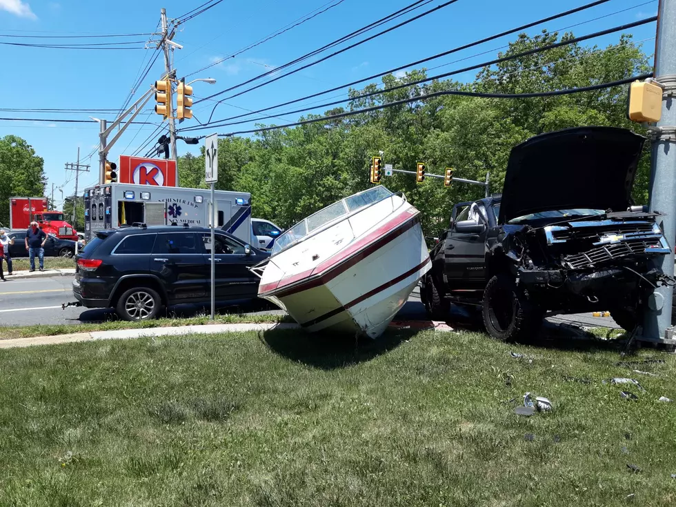 Three vehicles and a boat collide on Route 571 in Manchester