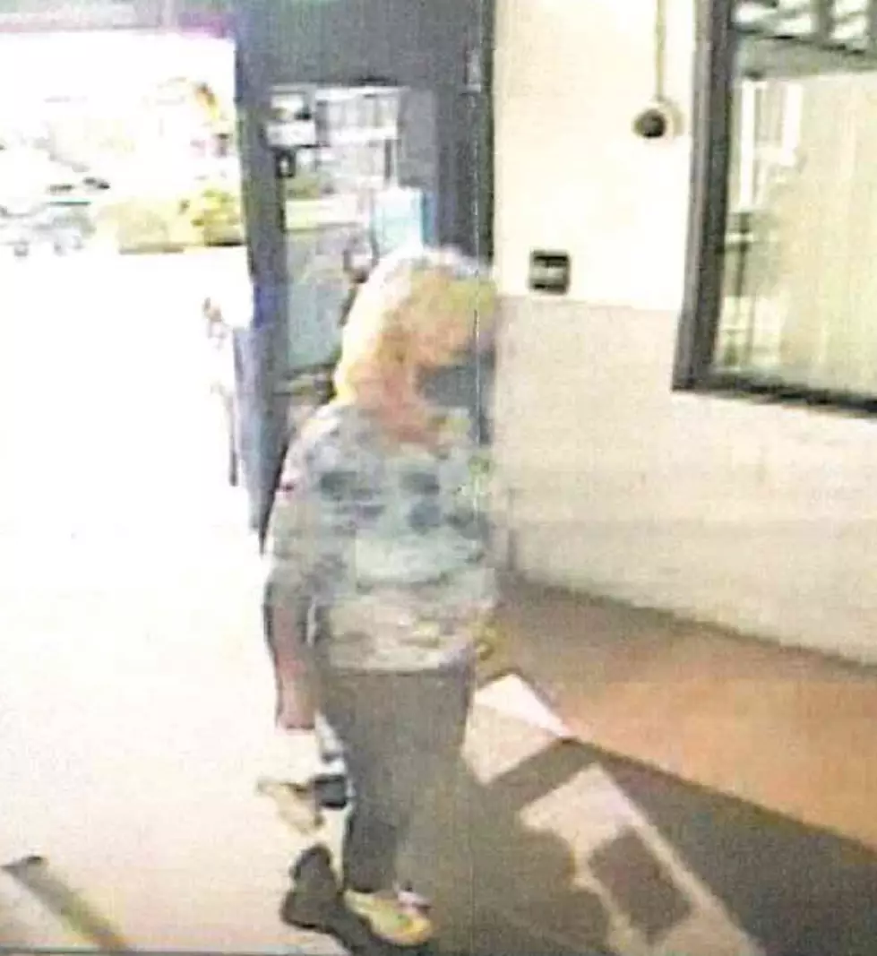 Manchester Police need your help identifying woman who stole wallet, used credit card