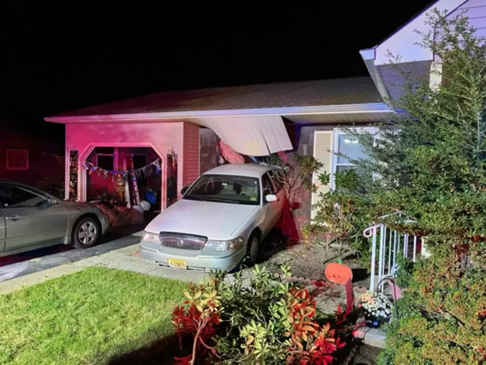 Whiting man loses control of vehicle, crashes into neighbors home