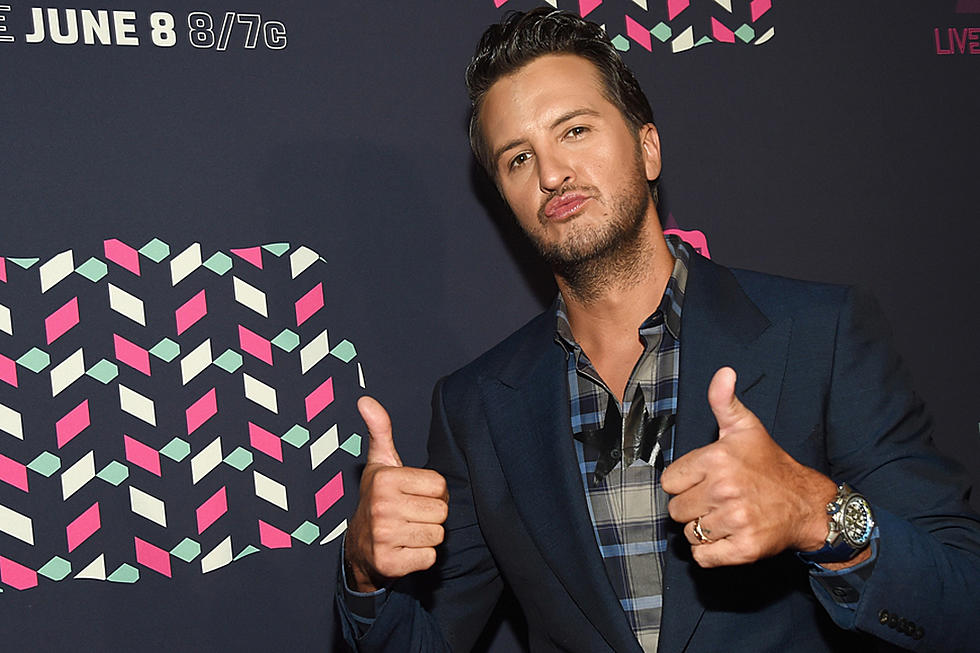 Luke Bryan Snaps Pic in Front of Rocky Statue