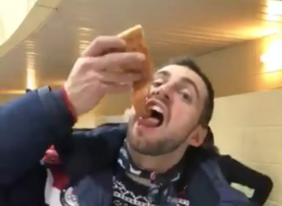 U.S. Olympian Downs a Slice of Pizza in One Bite