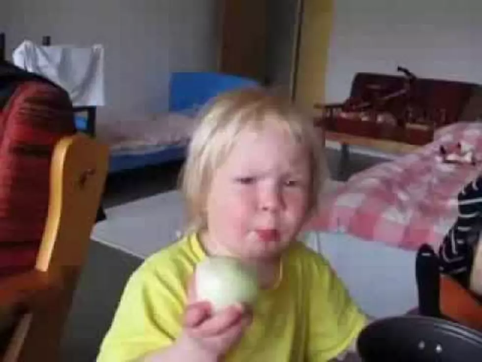 Adorable Little Girl Eats a Raw Onion and Looks Miserable But Just Keeps Going [VIDEO]