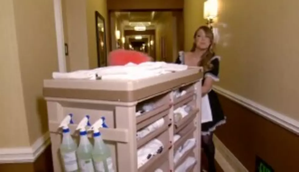 Watch to Find Out Why Mariah Carey is Pushing a Maid Cart [VIDEO]