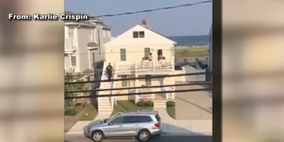 Ocean City Police Officer Helps Elderly Woman Carry Groceries Up Stairs