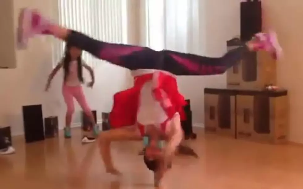 Watch This Girl Do Head Spins on a Soda Pop Can  [VIDEO]