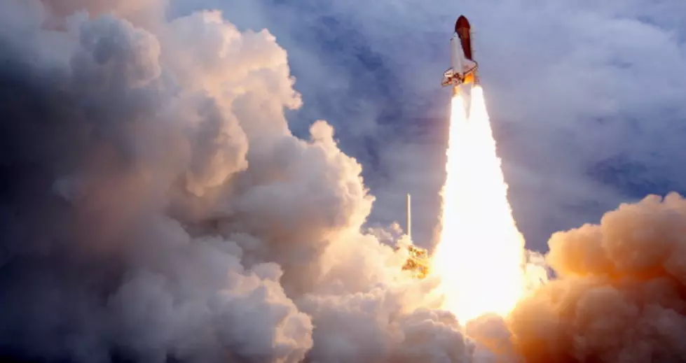 Watch a Space Shuttle Launch Looking Back at Earth