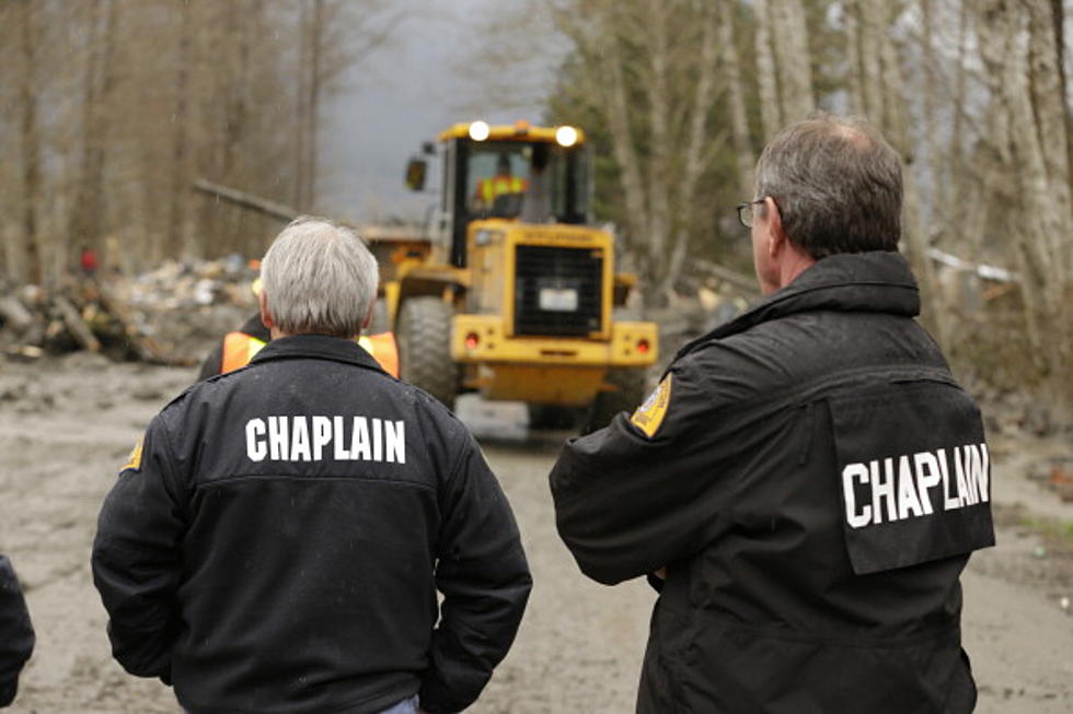 Mudslide Searchers Press On with Dogs, Bare Hands