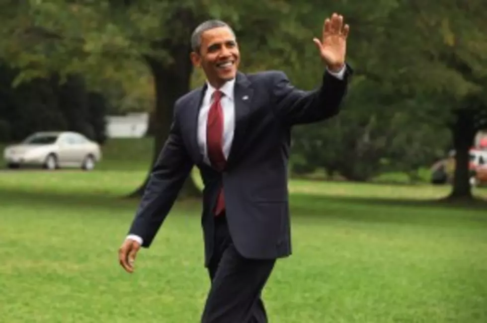 Obama Back In Washington On Rare Vacation Break